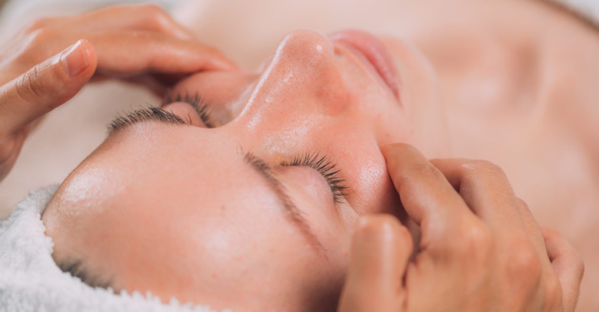 Facial,Massage,Beauty,Treatment.,Close-up,Of,A,Young,Woman’s,Face Facial,Massage,Beauty,Treatment.,Close-up,Of,A,Young,Woman’s,Face